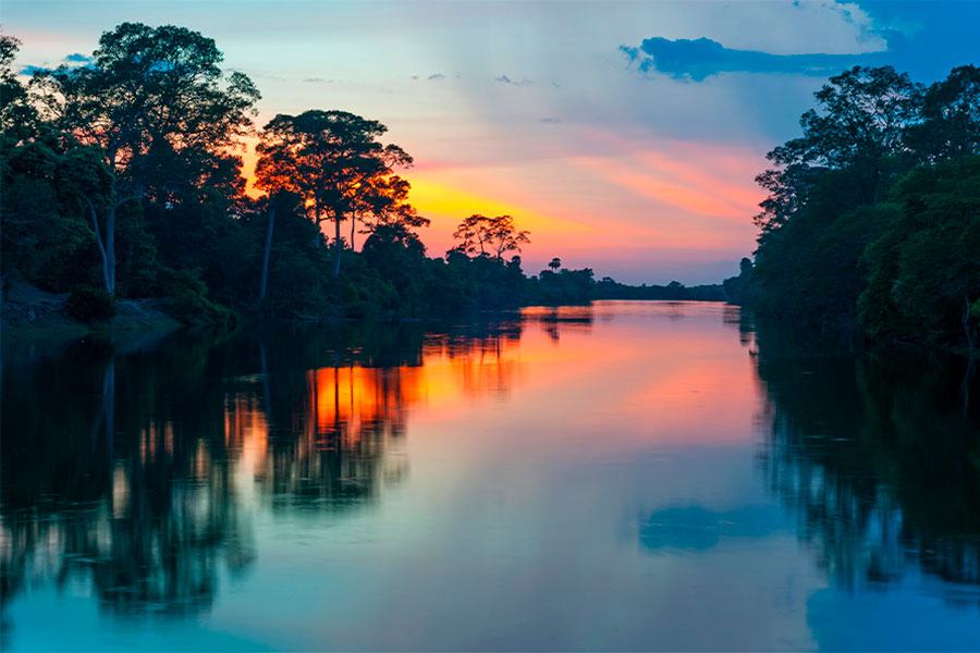 A sunset view in the Colombian Amazon. Keep this natural wonder of the world on your bucket list.