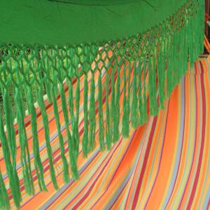 Hammock: a rainbow strung between two palm trees