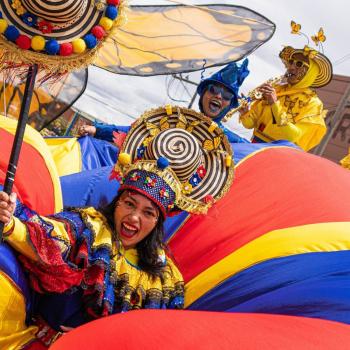 Artists performing during a parade at the Ibero-American Theater Festival of Bogotá | Colombia Travel